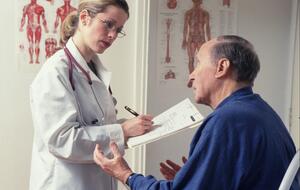 Man speaks to doctor