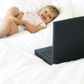 Toddler looks at screen