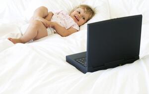 Toddler looks at screen
