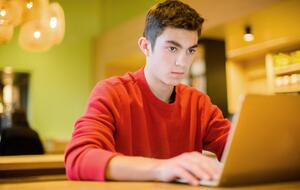 Boy using laptop