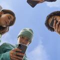 Teens using smartphones
